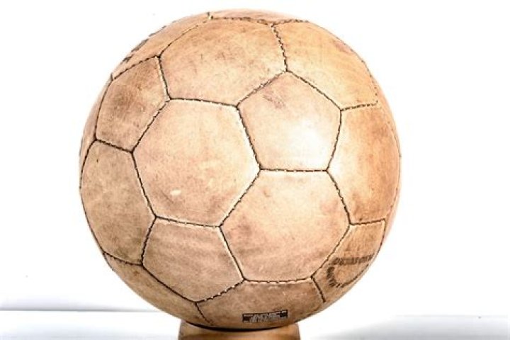 Who designed the first soccer ball?