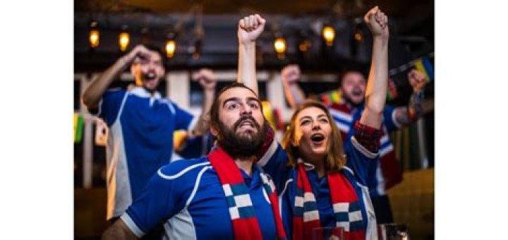 Why do soccer fans sing?
